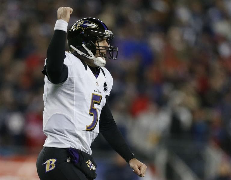 Baltimore Ravens quarterback Joe Flacco celebrates after an 11-yard touchdown pass to Anquan Boldin during the second half of the NFL football AFC Championship football game against the New England Patriots in Foxborough, Mass., Sunday, Jan. 20, 2013. (Charles Krupa/AP)