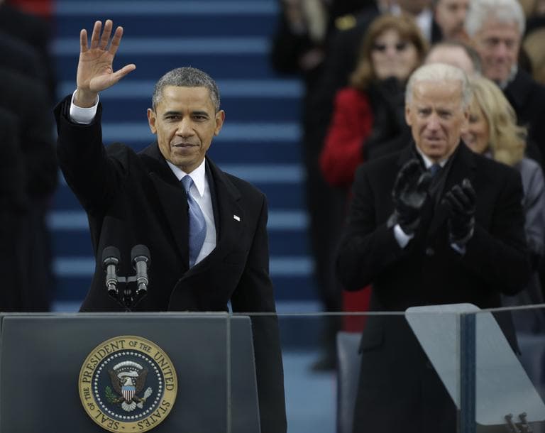 President Barack Obama waves after his speech while Vice President Joe Biden applauds at the ceremonial swearing-in at the U.S. Capitol during the 57th Presidential Inauguration in Washington, Monday. (Pablo Martinez Monsivais/AP)
