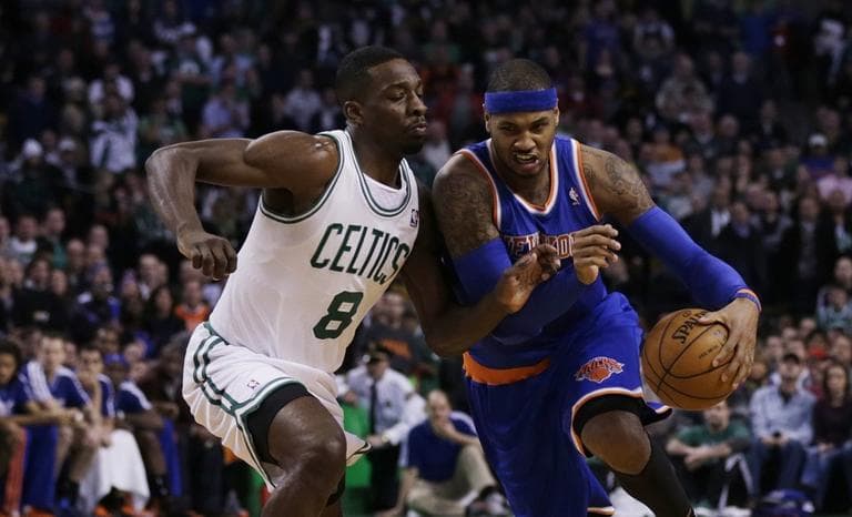 New York Knicks shooting guard James White (4) drives against Boston Celtics power forward Jeff Green  (AP/Charles Krupa)