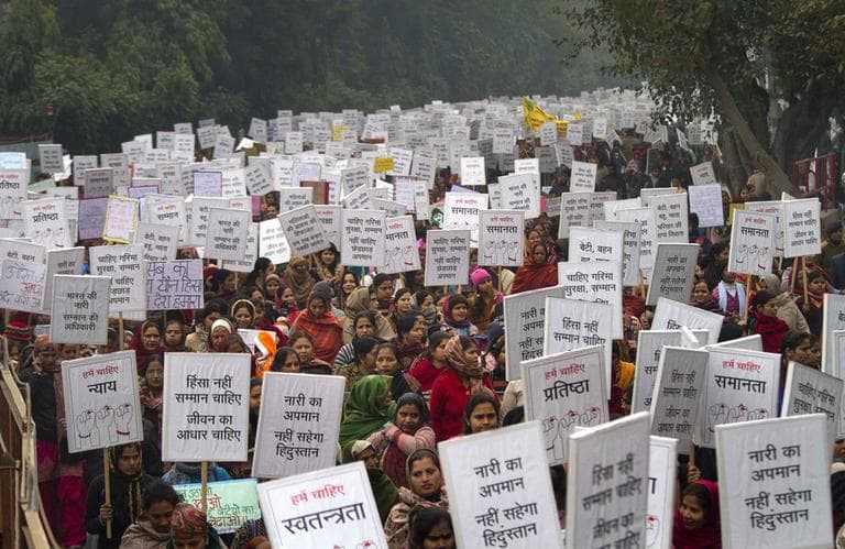 Indian women carry placards as they march to mourn the death of a gang rape victim in New Delhi, India, Wednesday, Jan. 2, 2013. (AP)