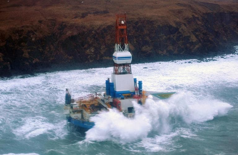 This image provided by the U.S. Coast Guard shows the Royal Dutch Shell drilling rig Kulluk aground off a small island near Kodiak Island Tuesday Jan. 1, 2013. (AP/Coast Guard)