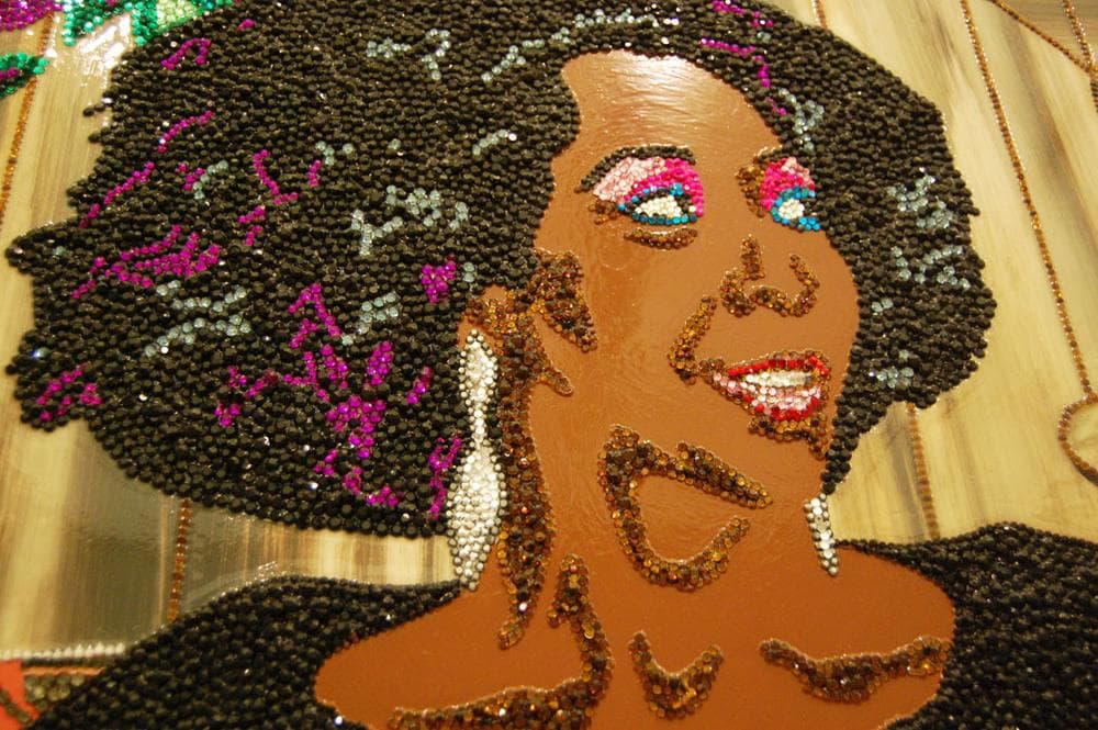 A close up of the rhinestone-encrusted surface of Mickalene Thomas’s 2009 portrait of her mother, “Sandra: She’s a Beauty.” (Greg Cook)
