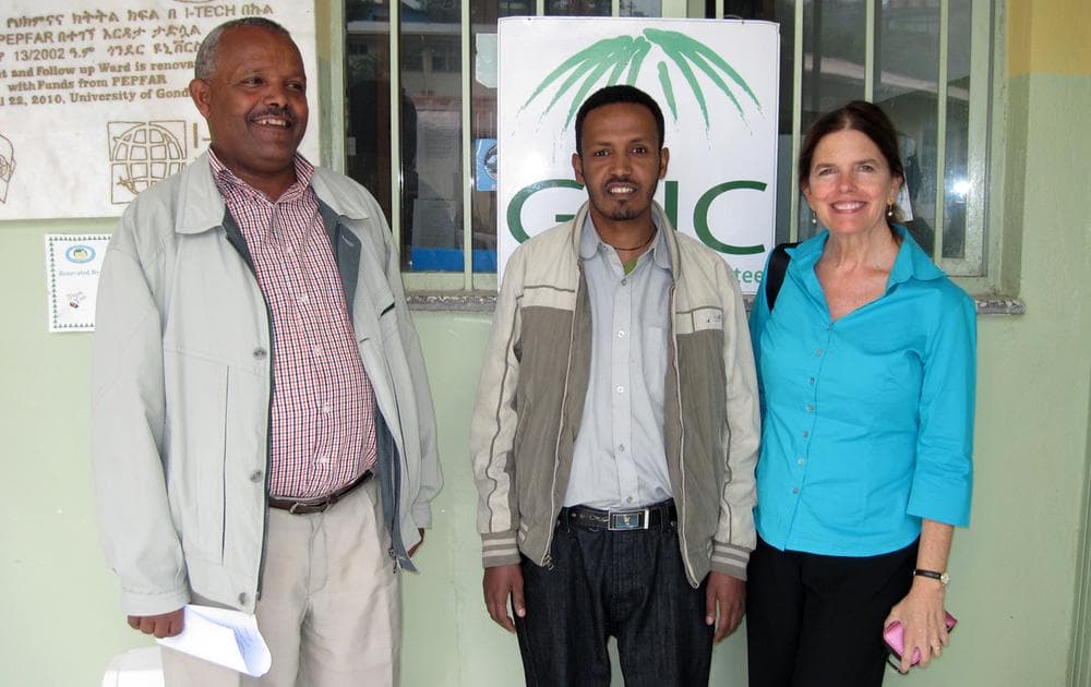 Anne Goldfeld (right) with her patient Gizachew (center) after receiving medication for tuberculosis in Ethiopia (Oct 2010).