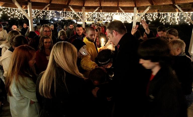 Members of the community gather to pray for a 5-year-old taken hostage, in Midland City, Ala., Sunday, Feb. 3, 2013. (Butch Dill/AP)
