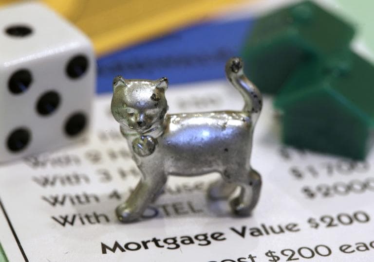 The newest Monopoly token, a cat. (Steven Senne/AP)