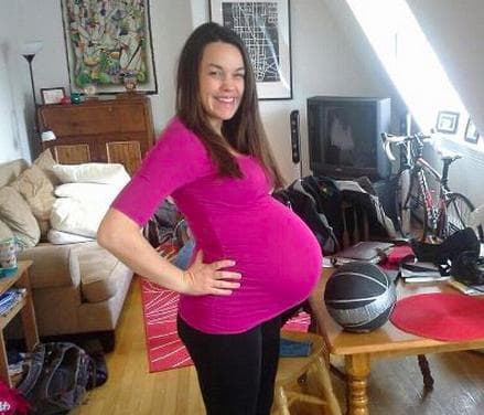 Kate Mitchell, pregnant with her first child. Her husband, Marton Balla, took this photo and told his wife, &quot;That basketball looks like a ping-pong ball next to you.&quot; (Courtesy of Marton Balla)