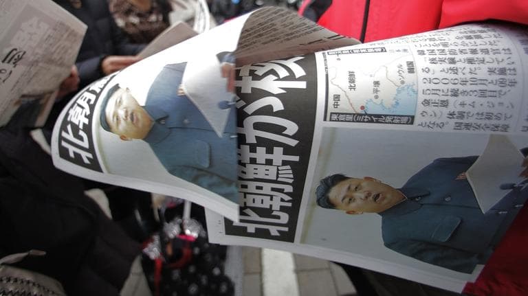 Copies of an extra edition of a Japanese newspaper reporting North Korea&#039;s nuclear test are handed out to passers-by in Tokyo on Tuesday. North Korea said it successfully detonated a miniaturized nuclear device at a northeastern test site, defying U.N. Security Council orders to shut down atomic activity or face more sanctions and international isolation. (Itsuo Inouye/AP)