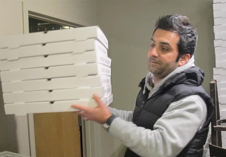 Former Upper Crust pizza deliveryman Mehmet Ali will manage the new Harvard Square pizza shop. (Curt Nickisch/WBUR)