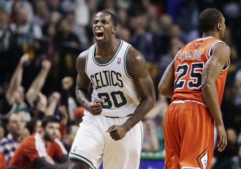 Brandon Bass celebrates after scoring as Chicago Bulls guard Marquis Teague looks on during the fourth quarter on Wednesday, (AP)