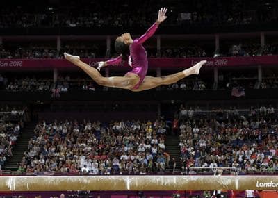 Gabby Douglas captured gold at the 2012 Olympics in London, making her the youngest African-American medalist. (Gregory Bull/AP)