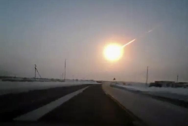 In this frame grab made from a video done with a dashboard camera, on a highway from Kostanai, Kazakhstan, to Chelyabinsk region, Russia, provided by Nasha Gazeta newspaper, on Friday, Feb. 15, 2013 a meteorite contrail is seen. (Nasha gazeta, www.ng.kz)