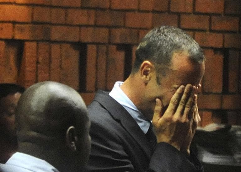 South African Paralympic and Olympic sprinter Oscar Pistorius wept in court Friday while being charged with his girlfriend's murder. (Antione de Ras/Independent Newspapers Ltd South Africa/AP) 