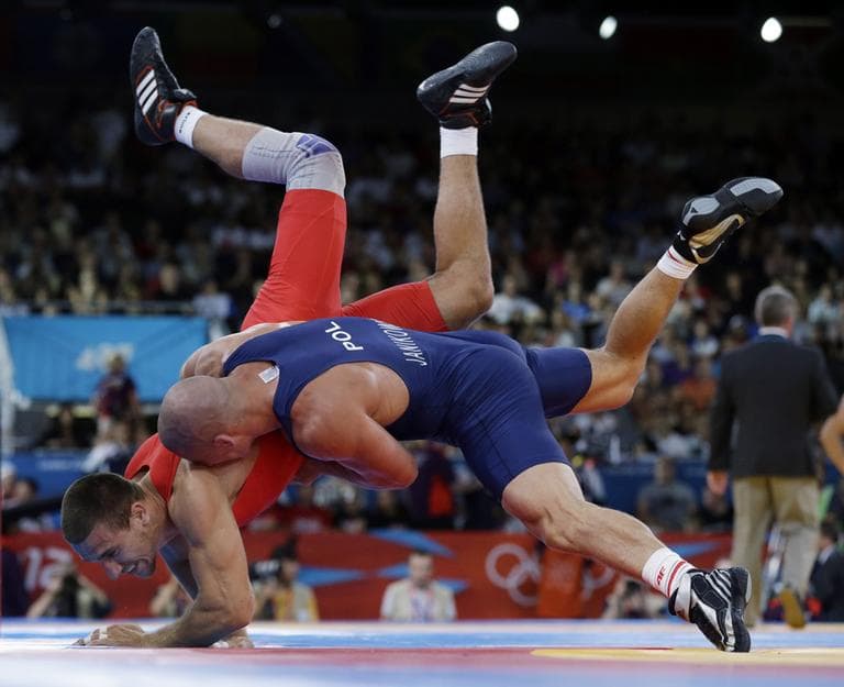 If the decision of the IOC Executive Board stands, wrestling will appear for the last time at the 2016 Olympics. (Paul Sancya/AP)