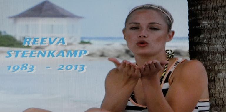 In this frame-grab from state television channel SABC 1 a tribute is devoted to slain model Reeva Steenkamp, girlfriend of Olympic athlete Oscar Pistorius. South Africa’s national broadcaster went ahead with the screening of the reality TV show &quot;Tropica Island of Treasure&quot; Saturday, Feb 16, 2013, featuring the dead model. Steenkamp encouraged her family to watch in one of her last conversations with them before her shooting death at the home of Pistorius. (Denis Farrell/AP)