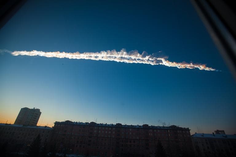 In this photo provided by Chelyabinsk.ru a meteorite contrail is seen over Chelyabinsk on Friday, Feb. 15, 2013. A meteor streaked across the sky of Russia’s Ural Mountains on Friday morning, causing sharp explosions and reportedly injuring around 100 people, including many hurt by broken glass. (Chelyabinsk.ru/AP)