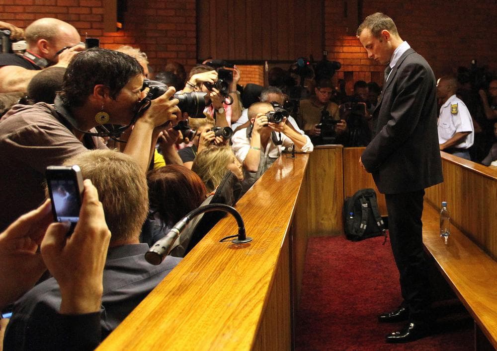 South African Olympian Oscar Pistorius has been granted bail after being charged with murdering his girlfiriend. (Themba Hadebe/AP)