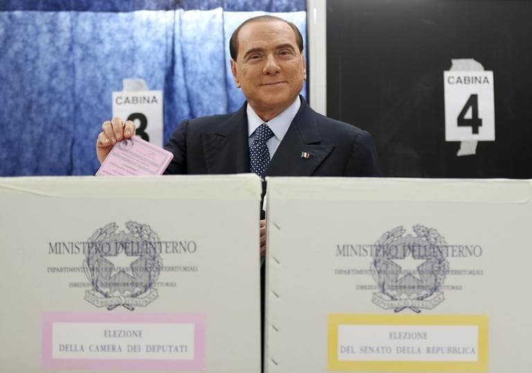 Former Premier Silvio Berlusconi casts his ballot in Milan, Italy, Sunday, Feb. 24, 2013. (Antonio Calanni/AP)