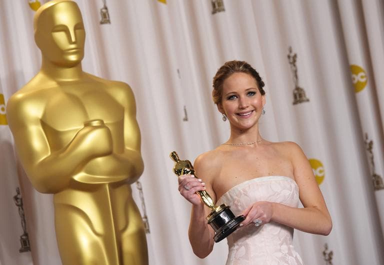 Jennifer Lawrence poses with her award for best actress in a leading role for &quot;Silver Linings Playbook&quot; during the Oscars at the Dolby Theatre on Sunday Feb. 24, 2013, in Los Angeles. (John Shearer/Invision/AP)