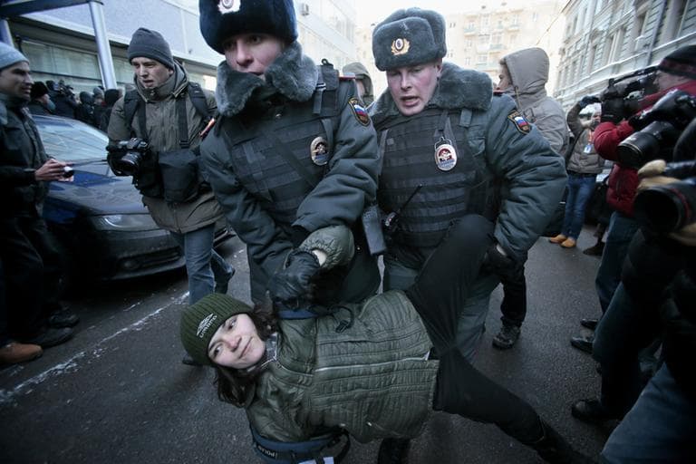 Police detain a gay rights activist during a protest near the State Duma, Russia's lower parliament chamber, in Moscow, Russia, Friday, Jan. 25, 2013. (Mikhail Metzel/AP)