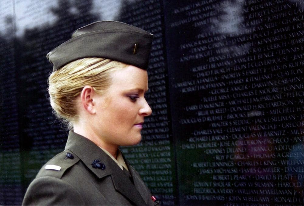 Lieutenant Elle Helmer at the Vietnam War Memorial, US Marine Corps, from THE INVISIBLE WAR, a Cinedigm/Docurama Films release.