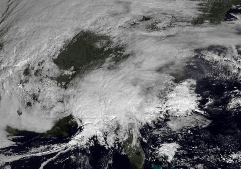 This image made available by NOAA shows storm systems over the eastern half of the United States on Thursday, Feb. 7, 2013 at 11:15 EST. A blizzard of potentially historic proportions threatened to strike the Northeast with a vengeance Friday, Feb. 8, 2013 with 1 to 2 feet of snow feared along the densely populated Interstate 95 corridor from the New York City area to Boston and beyond. (AP Photo/NOAA)