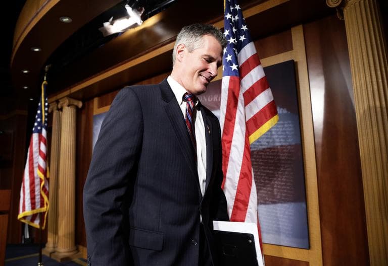 Sen. Scott Brown, R-Mass., departs after speaking during a media availability, on Capitol Hill Tuesday, Nov. 13, 2012, in Washington. (AP Photo/Alex Brandon)