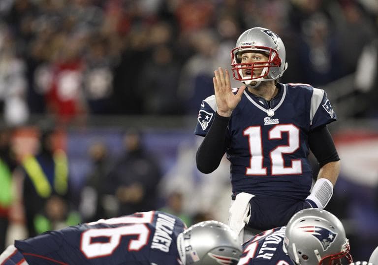 New England Patriots quarterback Tom Brady (12) calls signals at the line during the first half of the NFL football AFC Championship football game against the Baltimore Ravens in Foxborough, Mass., Sunday, Jan. 20, 2013. (AP Photo/Stephan Savoia)