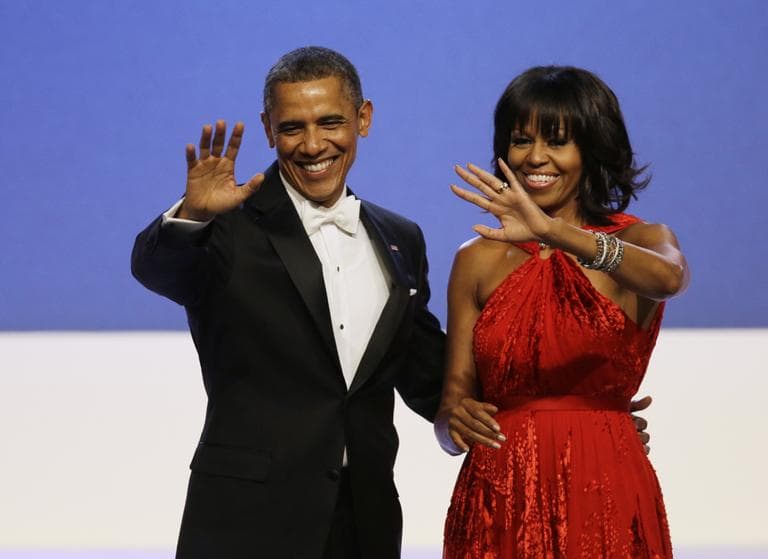 FILE - In this Jan. 21, 2013, file photo, President Barack Obama and Michelle Obama wave to guests after their dance at the Inaugural Ball at the 57th Presidential Inauguration in Washington. Michelle Obama has a new look, both in person and online, and with the president's re-election, she has four more years as first lady, too. The first lady is trying to figure out what comes next for this self-described &quot;mom in chief&quot; who also is a champion of healthier eating, an advocate for military families, a fitness buff and the best-selling author of a book about her White House garden. For certain, she'll press ahead with her well-publicized efforts to reduce childhood obesity and rally the country around its service members. (AP Photo/Paul Sancya, File)