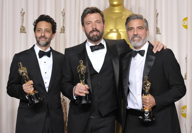 Grant Heslov, from left, Ben Affleck, and George Clooney pose with their award for best picture for &quot;Argo&quot; during the Oscars at the Dolby Theatre on Sunday Feb. 24, 2013, in Los Angeles. (Photo by John Shearer/Invision/AP)