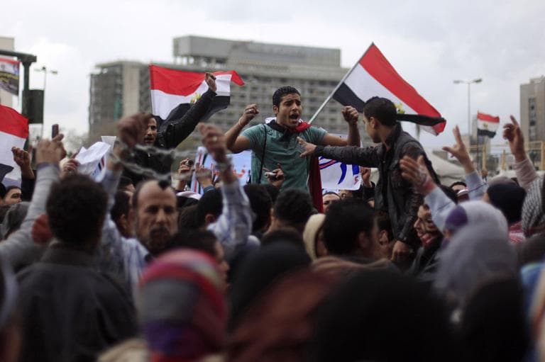 Egyptian protesters chant anti-government slogans during a rally in Tahrir Square, Cairo, Egypt, Friday, Feb. 1, 2013. (AP)