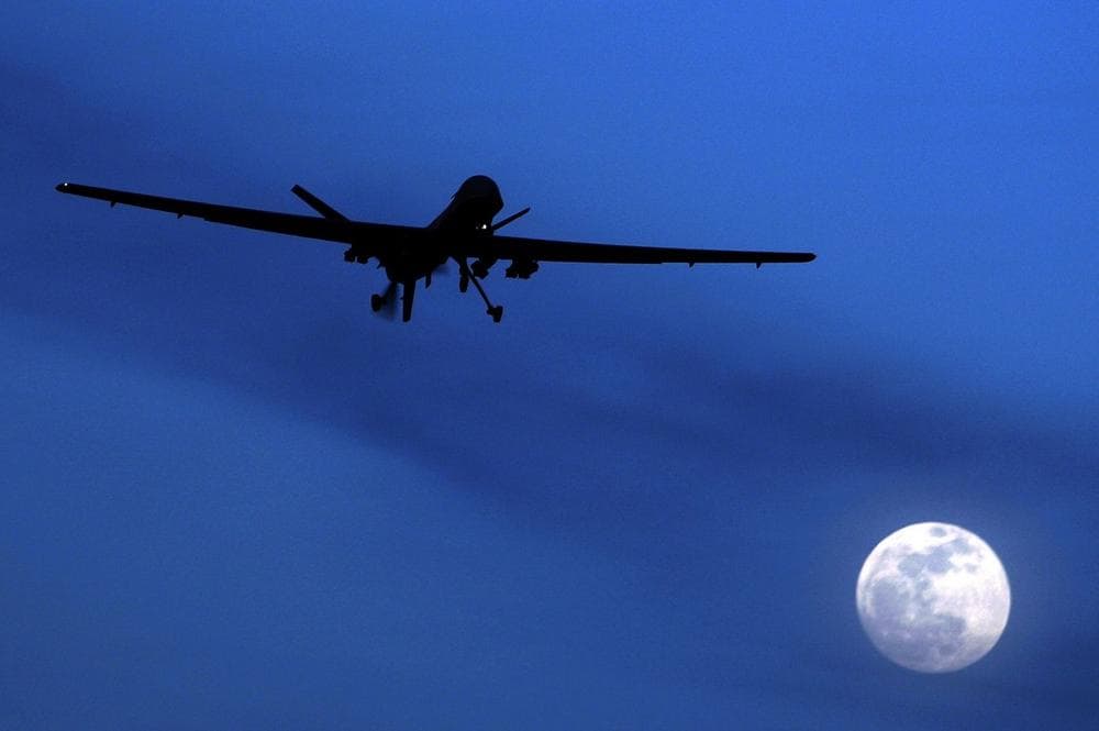  In this Jan. 31, 2010 file photo, an unmanned U.S. Predator drone flies over Kandahar Air Field, southern Afghanistan, on a moon-lit night. (AP)