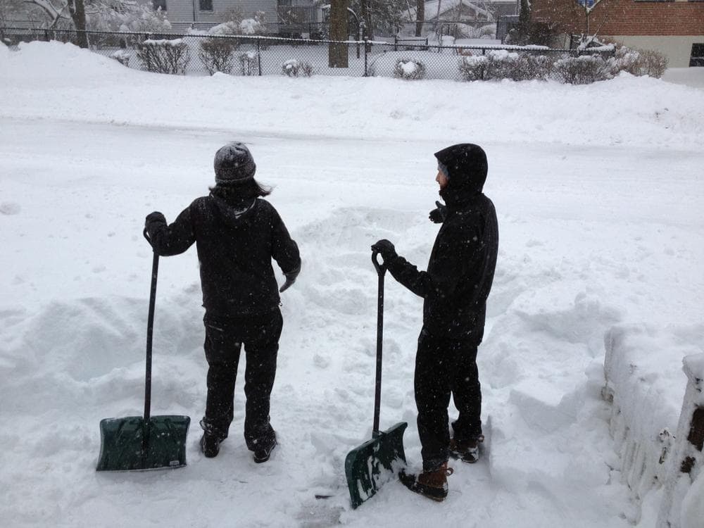 Brookline residents shoveling their way out to the street: (Dina Rosendorff/WBUR)