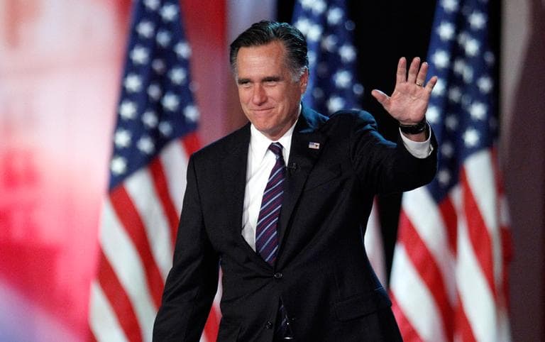 In this Nov. 7, 2012, file photo, Republican presidential candidate and former Massachusetts Gov. Mitt Romney waves to supporters at an election night rally in Boston, where he conceded the race to President Barack Obama. Romney has emerged from nearly four months in seclusion for an interview with Fox News. (Stephan Savoia/AP File)