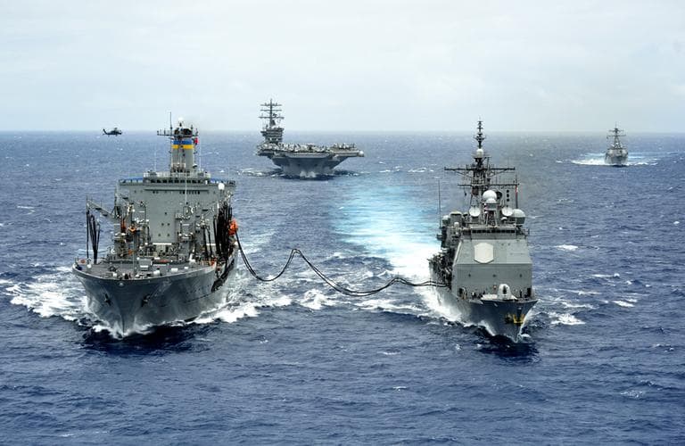 The Military Sealift Command fleet replenishment oiler USNS Henry J. Kaiser (T-AO 187), left, delivers a 50-50 blend of advanced biofuels and traditional petroleum-based fuel to the guided-missile cruiser USS Princeton (CG 59) during the Great Green Fleet demonstration portion of Rim of the Pacific (RIMPAC) 2012 exercise. July 18, 2012. (MC3 Ryan Mayes/U.S. Navy)