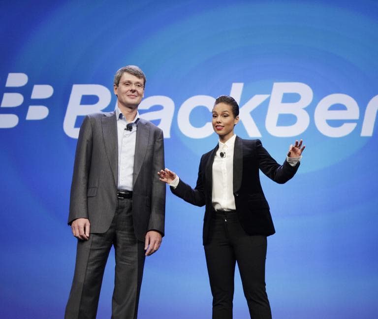 Thorsten Heins, CEO of Research in Motion, introduces Alicia Keys as the Global Creative director of BlackBerry, Wednesday, Jan. 30, 2013 in New York. (Mark Lennihan/AP)