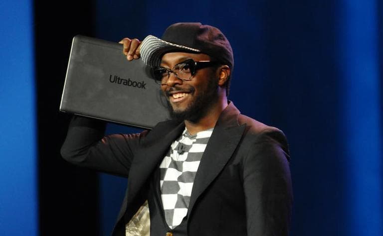 Hip hop artist will.i.am is pictured holding Intel's Ultrabook. He has a new gig as director of creative innovation at Intel. (intel.com)