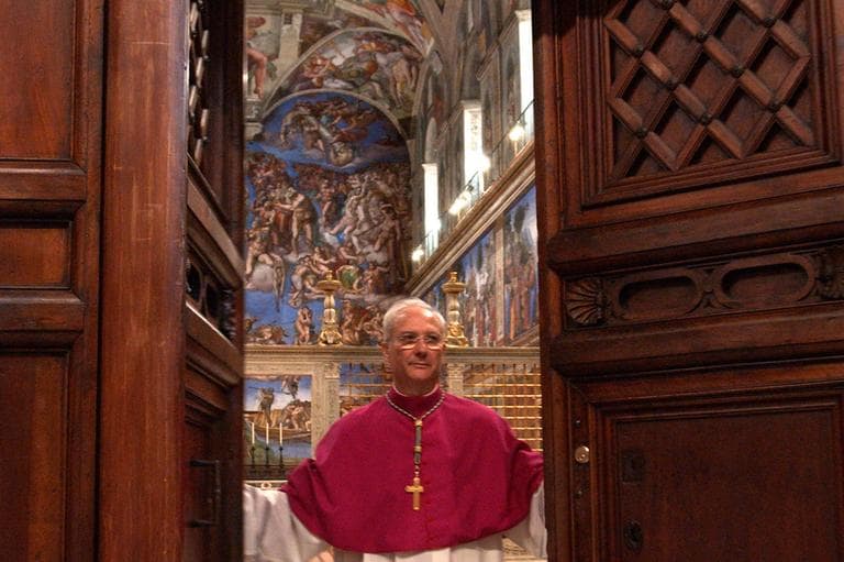 Master of Liturgical Celebrations Archbishop Piero Marini closes the doors of the Sistine Chapel at the Vatican on April 18, 2005, in preparation for the previous conclave. (Osservatore Romano/AP)