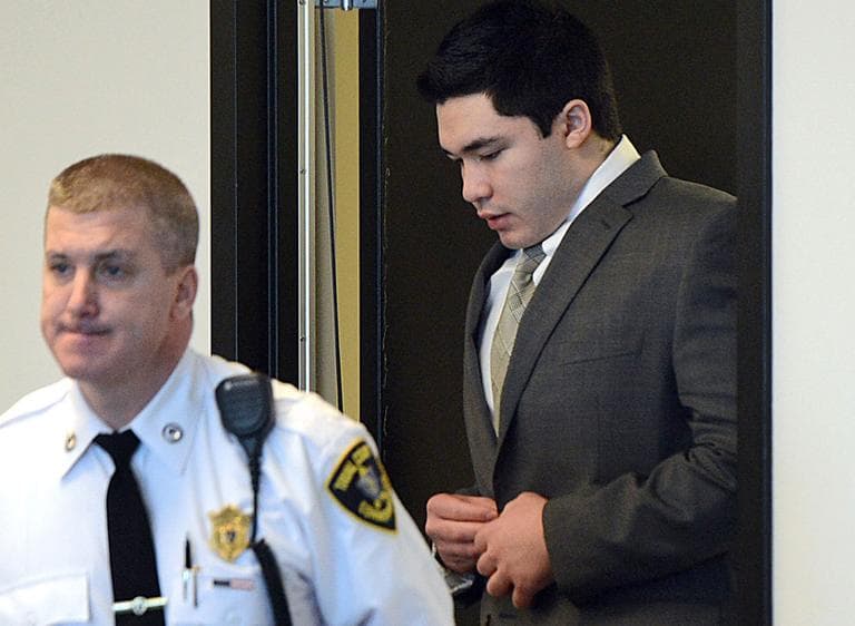 Nathaniel Fujita, right, enters the courtroom for the jury's verdict at his murder trial Thursday in Middlesex Superior Court in Woburn. (MetroWest Daily News/AP, Pool)