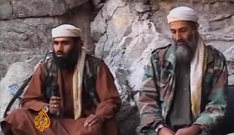 Sulaiman Abu Ghaith, left, is seen with Osama bin Laden in a video image released by Al Jazeera in 2001. 