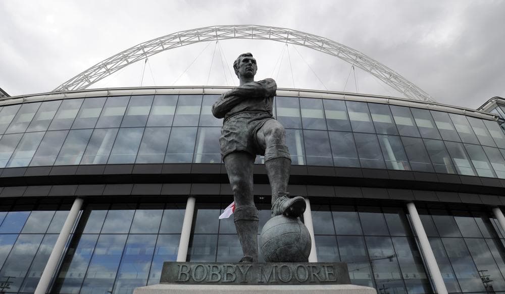 This statue of Bobby Moore, captain of England's 1966 World Cup team, is among, if not the, the most famous in Great Britain. (Tom Hevezi/AP)