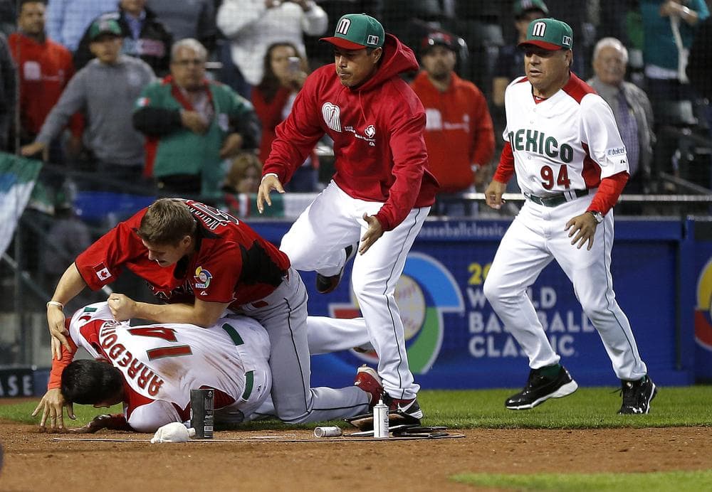 The scene turned ugly at the World Baseball Classic when Canada and Mexico squared off. (Matt York/AP)
