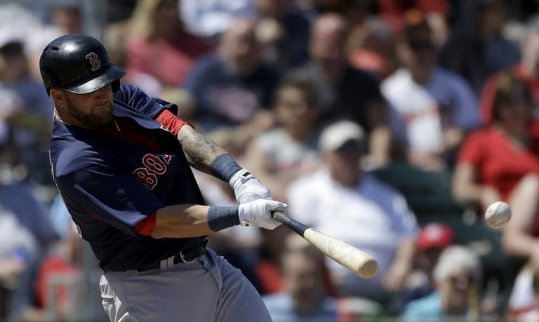 Red Sox's Mike Napoli plays in a spring training exhibition baseball game.(AP/David Goldman)
