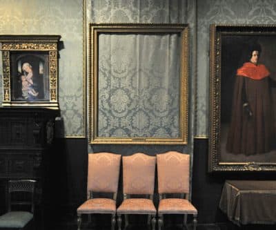 In this March 11, 2010 photo, the empty frame, center, from which thieves cut Rembrandt's &quot;Storm on the Sea of Galilee&quot; remains on display at the Isabella Stewart Gardner Museum in Boston. (Josh Reynolds/AP)