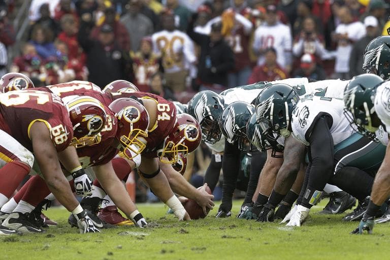 The Washington Redskins and Philadelphia Eagles lineup across the line of scrimmage during the second half of an NFL football game in Landover, Md., Sunday, Nov. 18, 2012. (Patrick Semansky/AP)