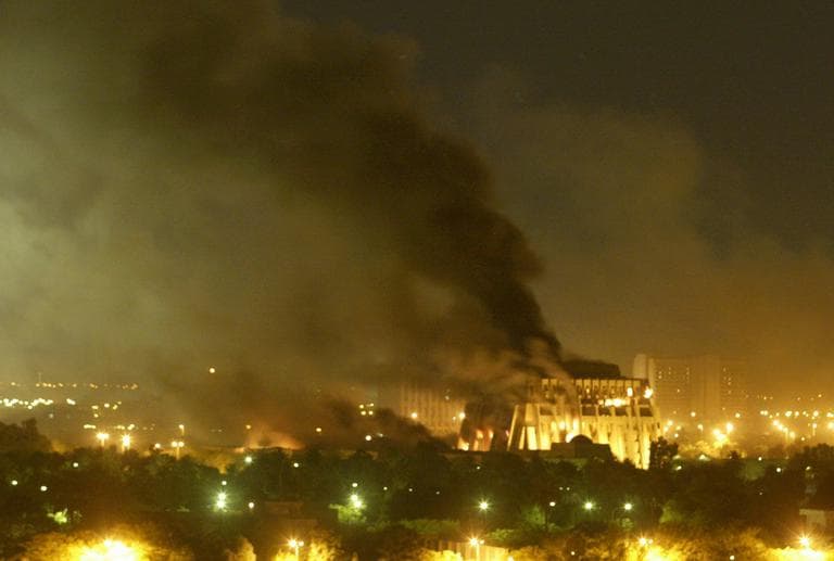 A government building burns during heavy bombardment of Baghdad, Iraq by U.S.-led forces Friday evening, March 21, 2003. (Jerome Delay/AP)
