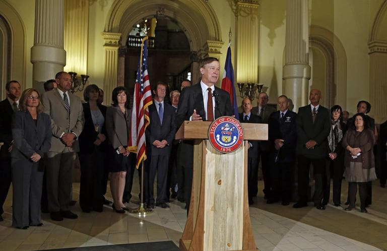 Colorado Gov. John Hickenlooper speaks at a news conference at the Capitol in Denver on Wednesday, March 20, 2013, about the shooting death of Tom Clements the Executive Director of the Department of Corrections. (Ed Andrieski/AP)