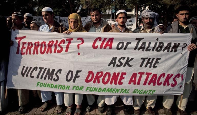 Pakistani tribal villagers hold a rally on Dec. 10, 2010, to condemn U. S. drone attacks on their villages in border areas along the Afghanistan border, in Islamabad, Pakistan. (B.K. Bangash/AP)