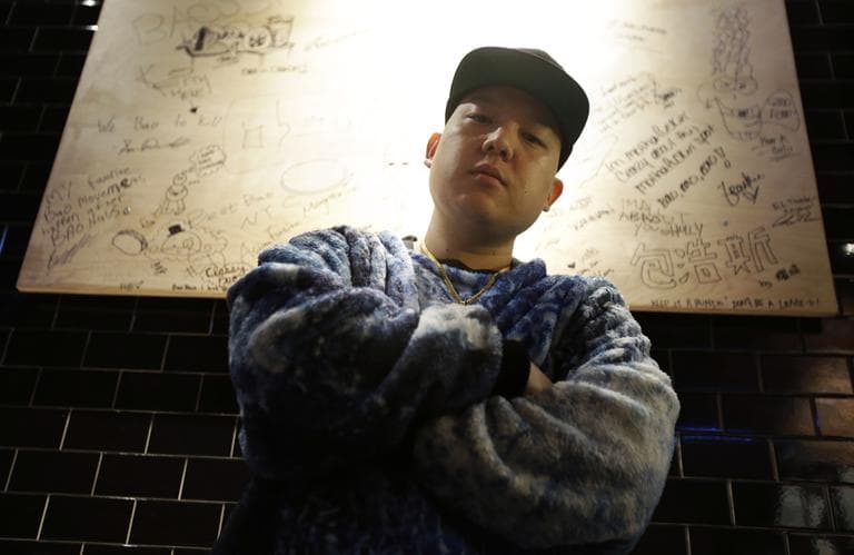 Eddie Huang poses for a picture at his restaurant Baohaus in New York, January 28, 2013. (Seth Wenig/AP)