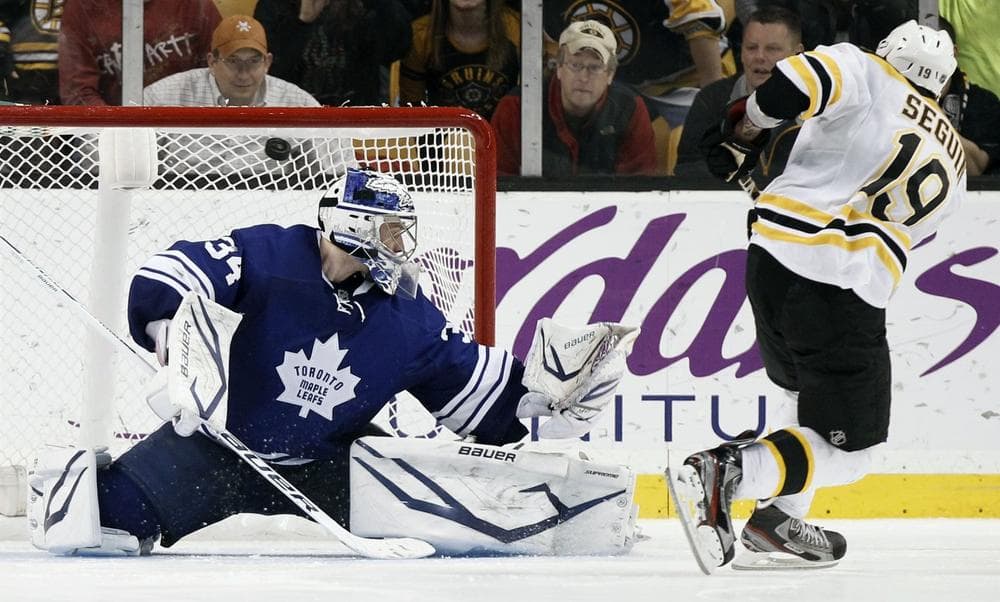 Tyler Seguin scores on Maple Leafs goalie James Reimer during the shootout in Boston&#039;s 3-2 win. (AP)