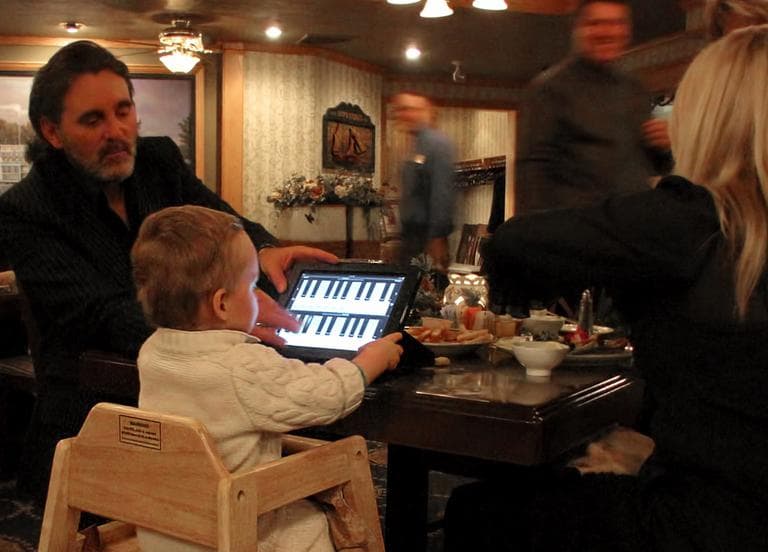&quot;This child and his parents were seated at the table next to ours at a restaurant last evening... His parents worked hard to keep him occupied but nothing seemed to last beyond a minute or two until... the iPad appeared.&quot; (Dick Jensen/Flickr)
